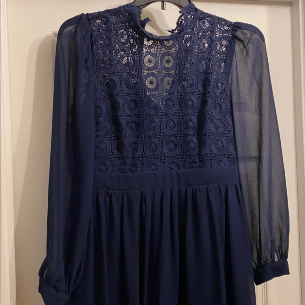 Dress with eyelet detail